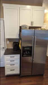 New cabinets around a refrigerator